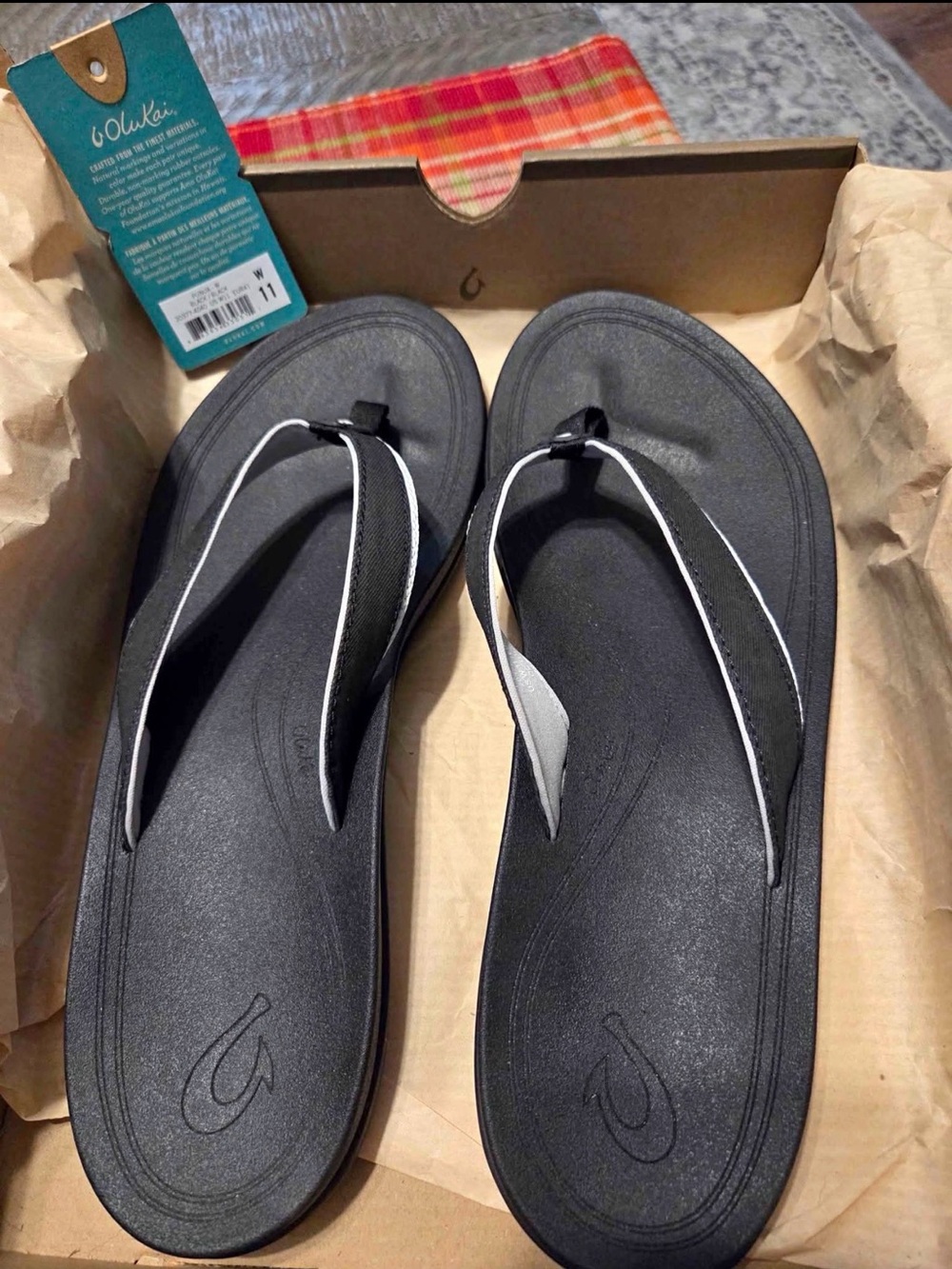 OluKai Black/Black Flip Flop Sandals